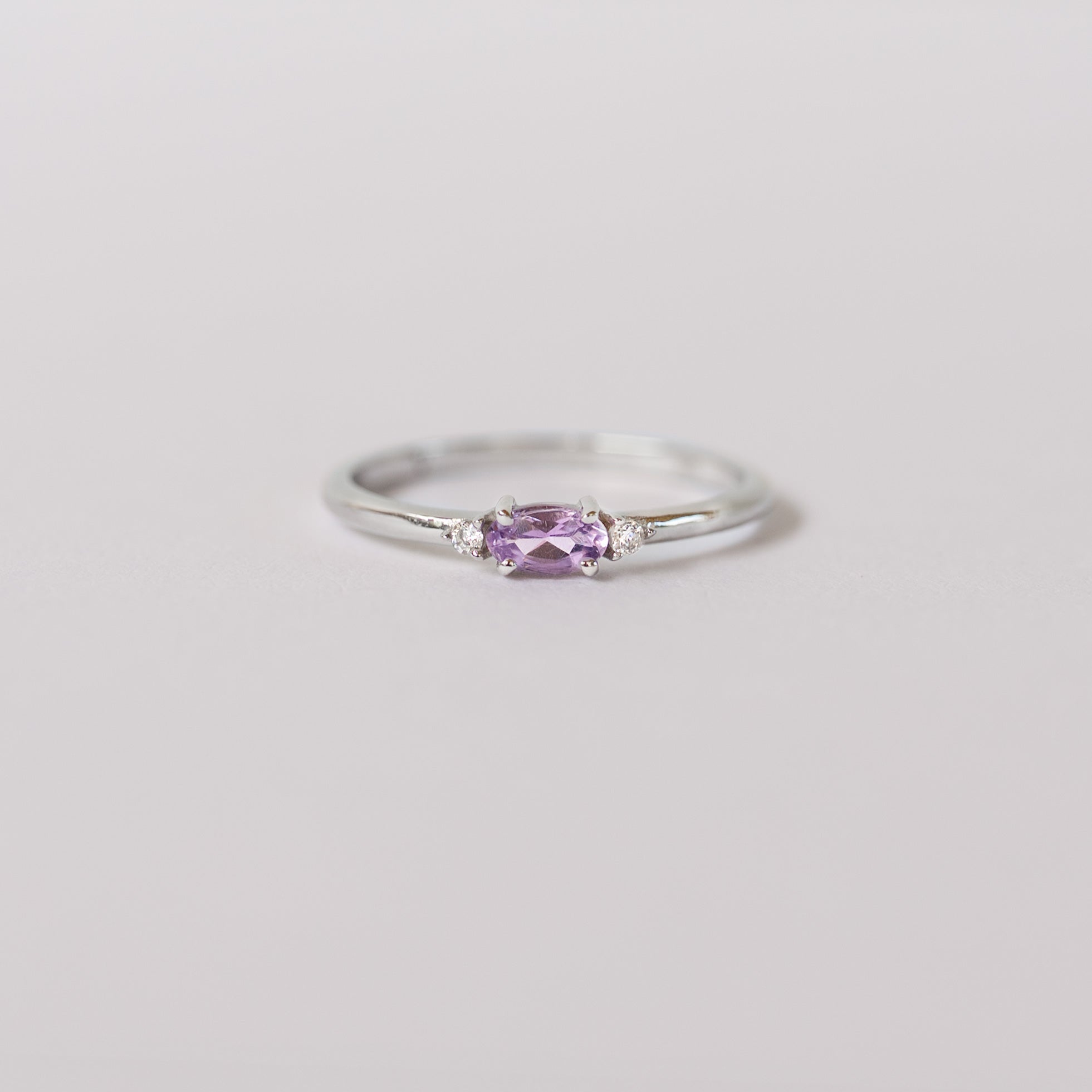Silver dainty birthstone stacking ring with a real amethyst gemstone