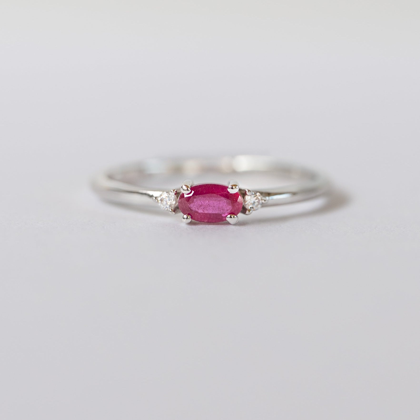 Silver dainty stacking ring with real ruby gemstone.