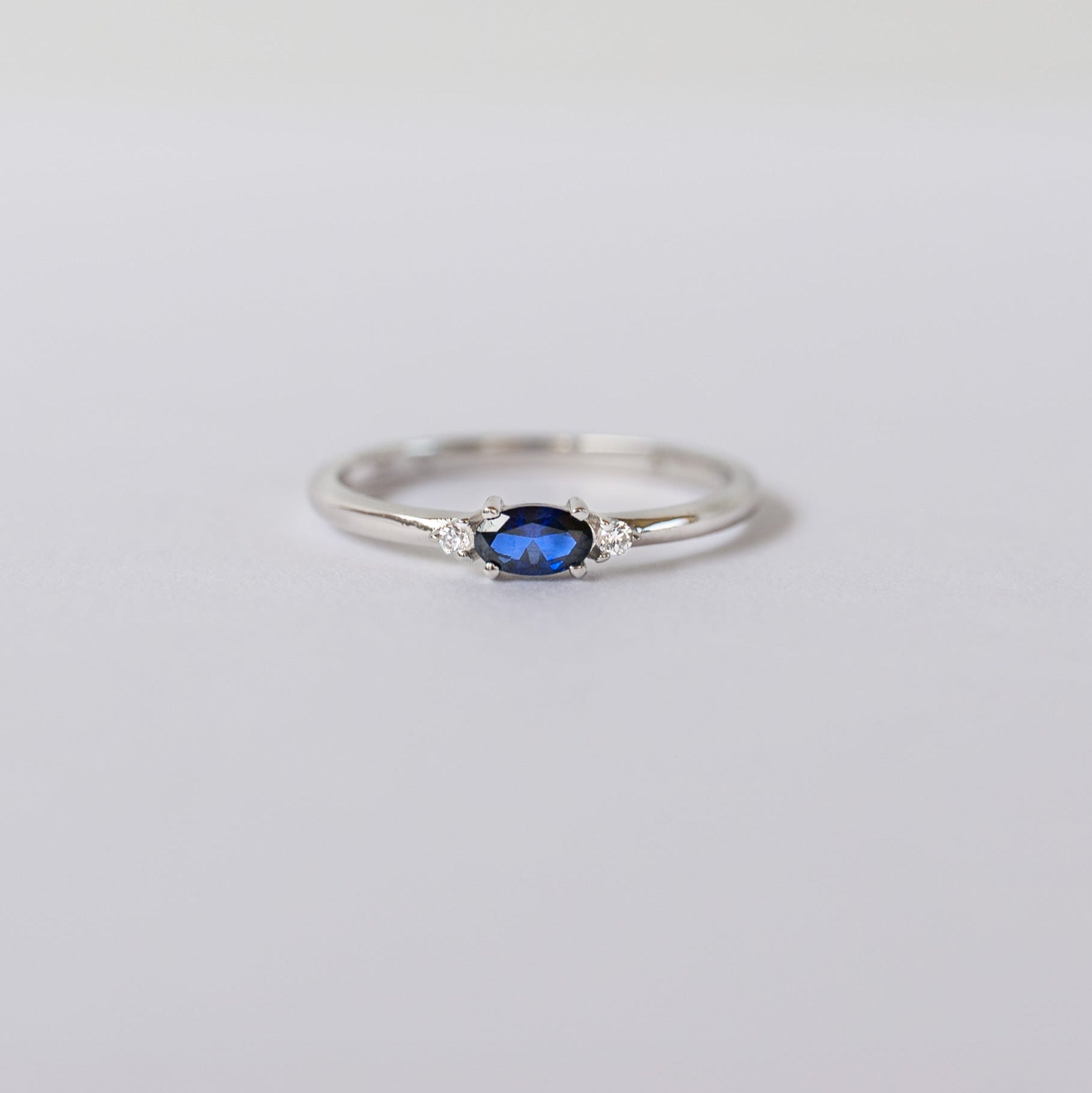 Silver dainty stacking ring with real sapphire.