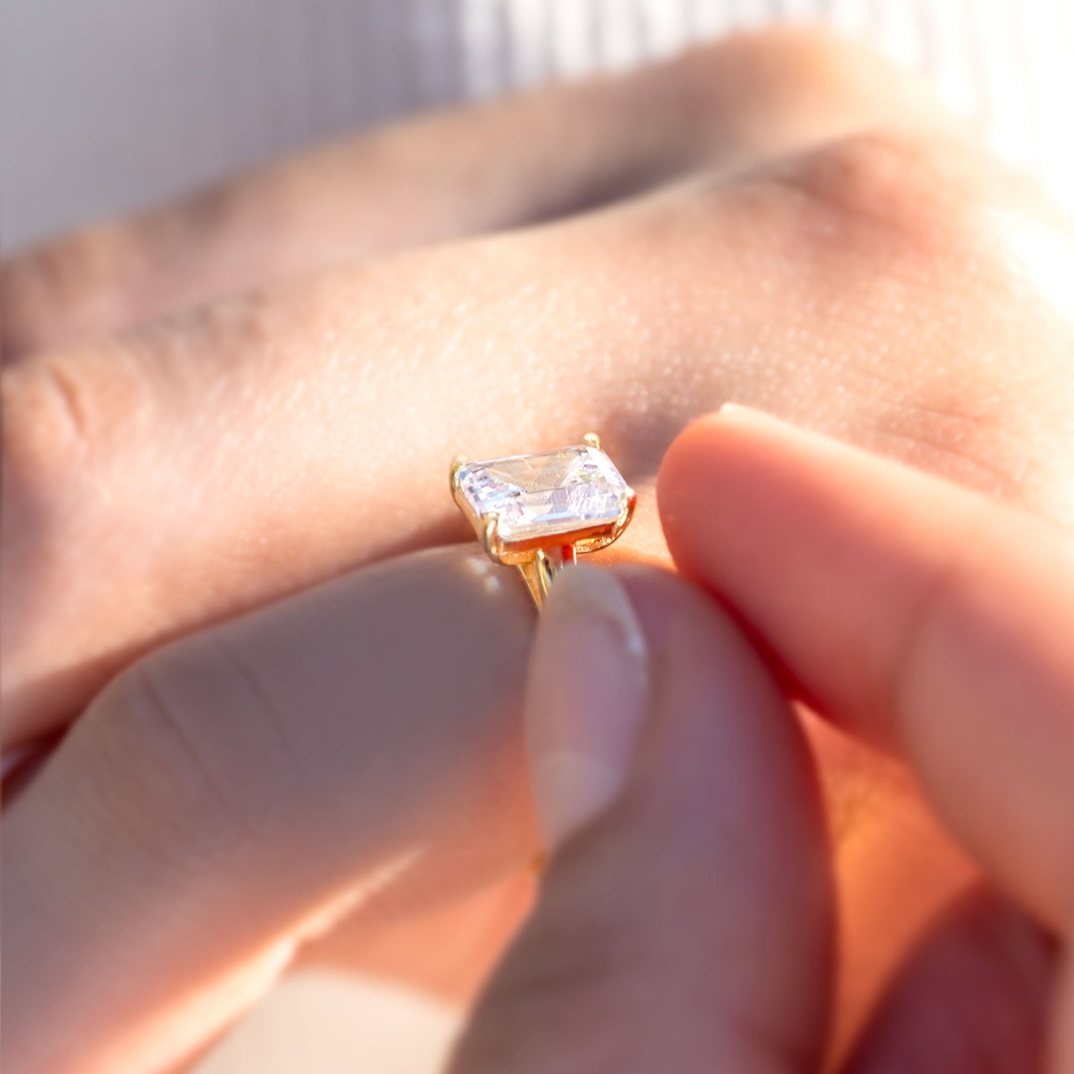 White topaz gold ring emerald cut