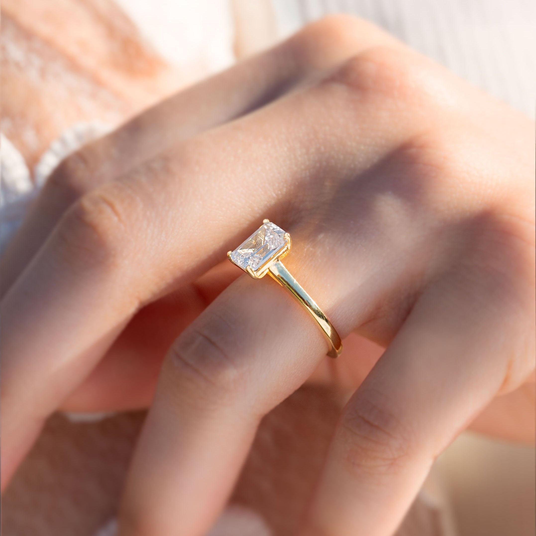 White topaz gold ring emerald cut