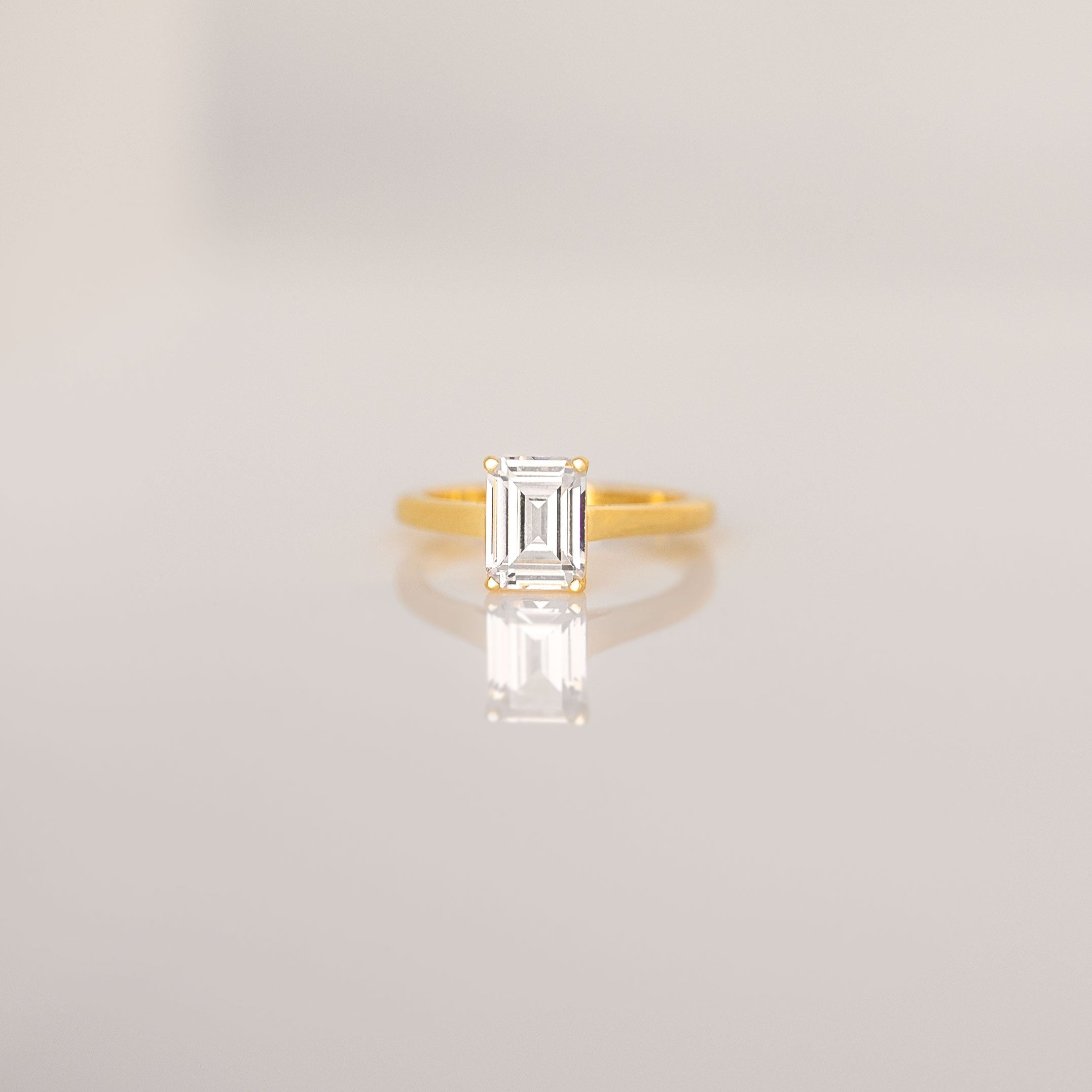 White topaz gold ring emerald cut