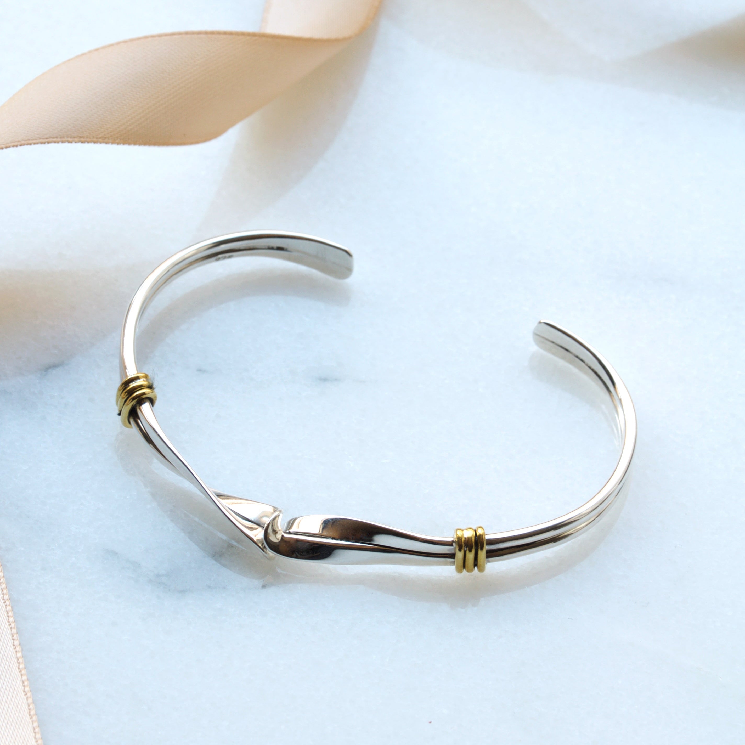 Bracelet With A Twist Cuff