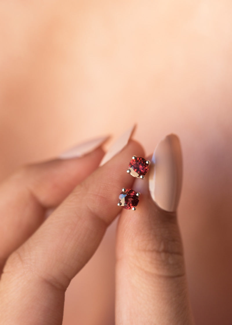 garnet studs earrings in sterling silver