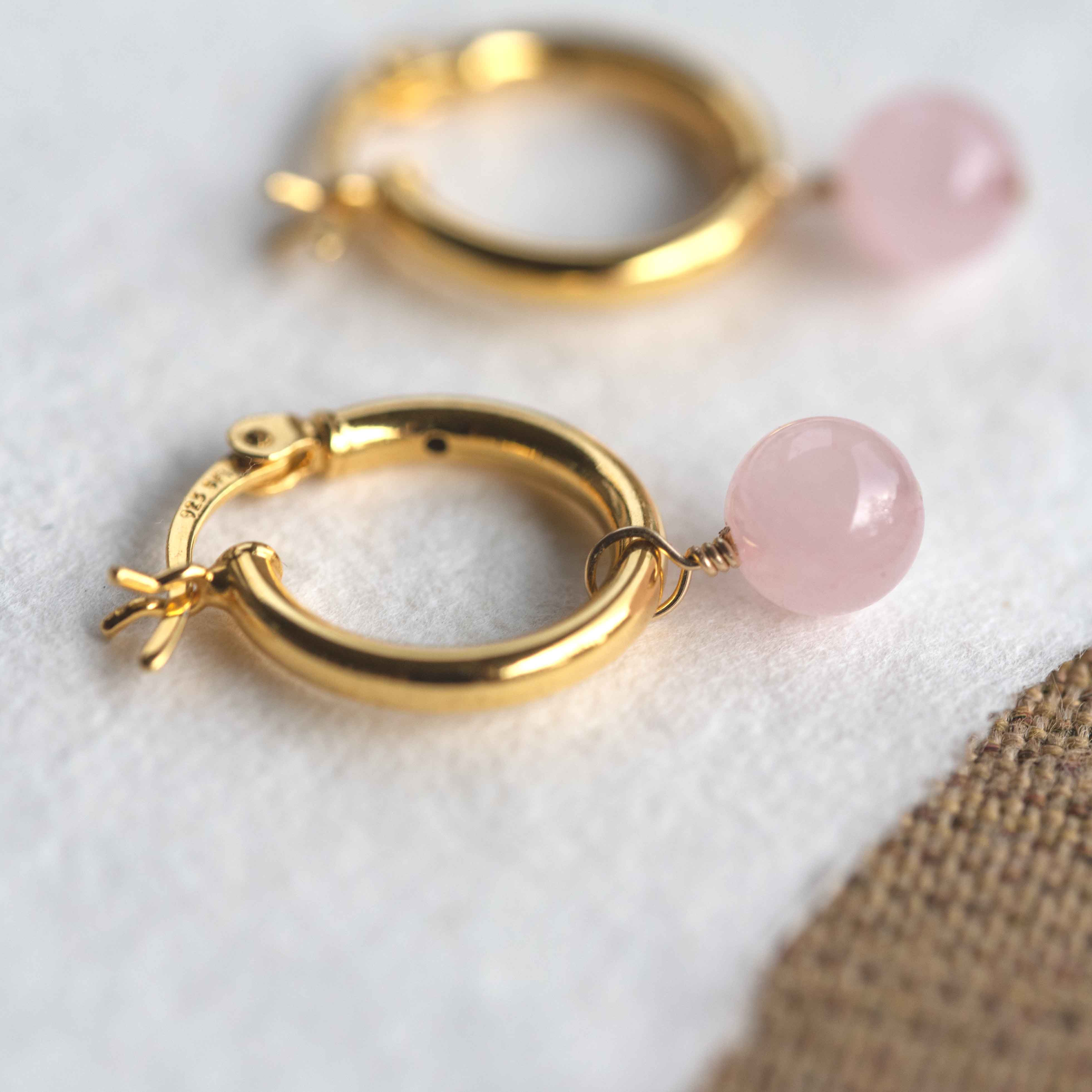 rose quartz earrings in gold hoops