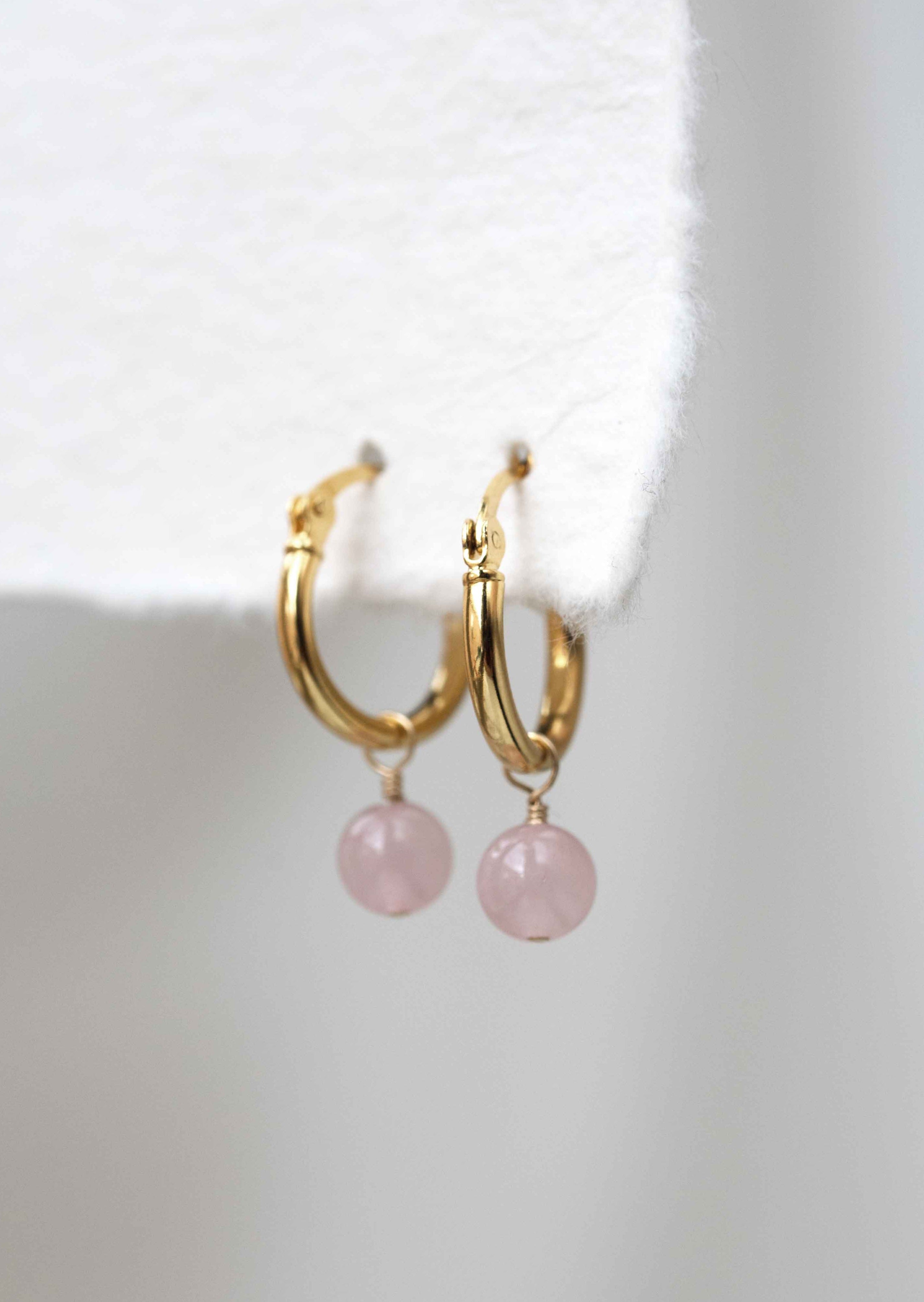 rose quartz earrings in gold hoops