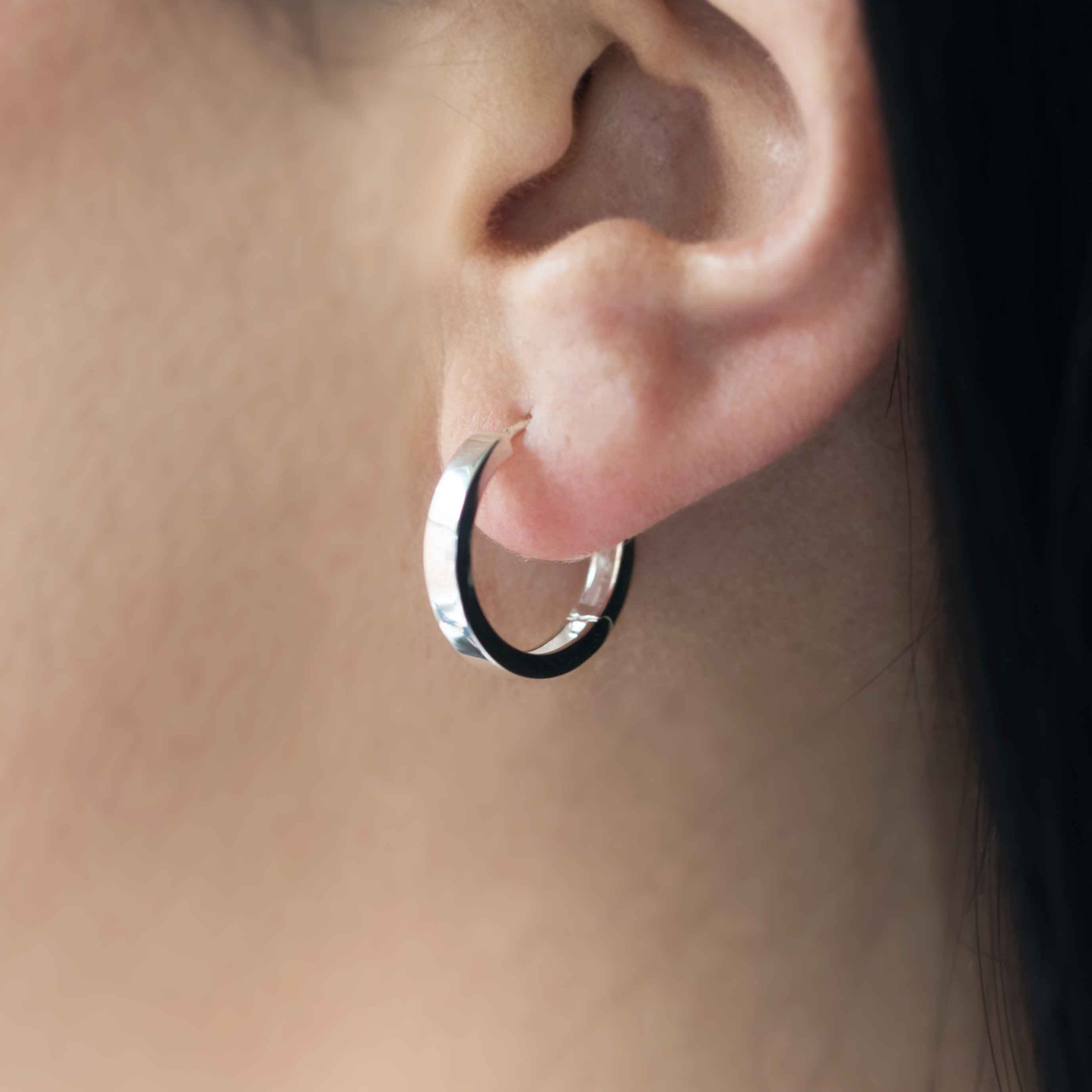 Medium flat hoops in sterling silver