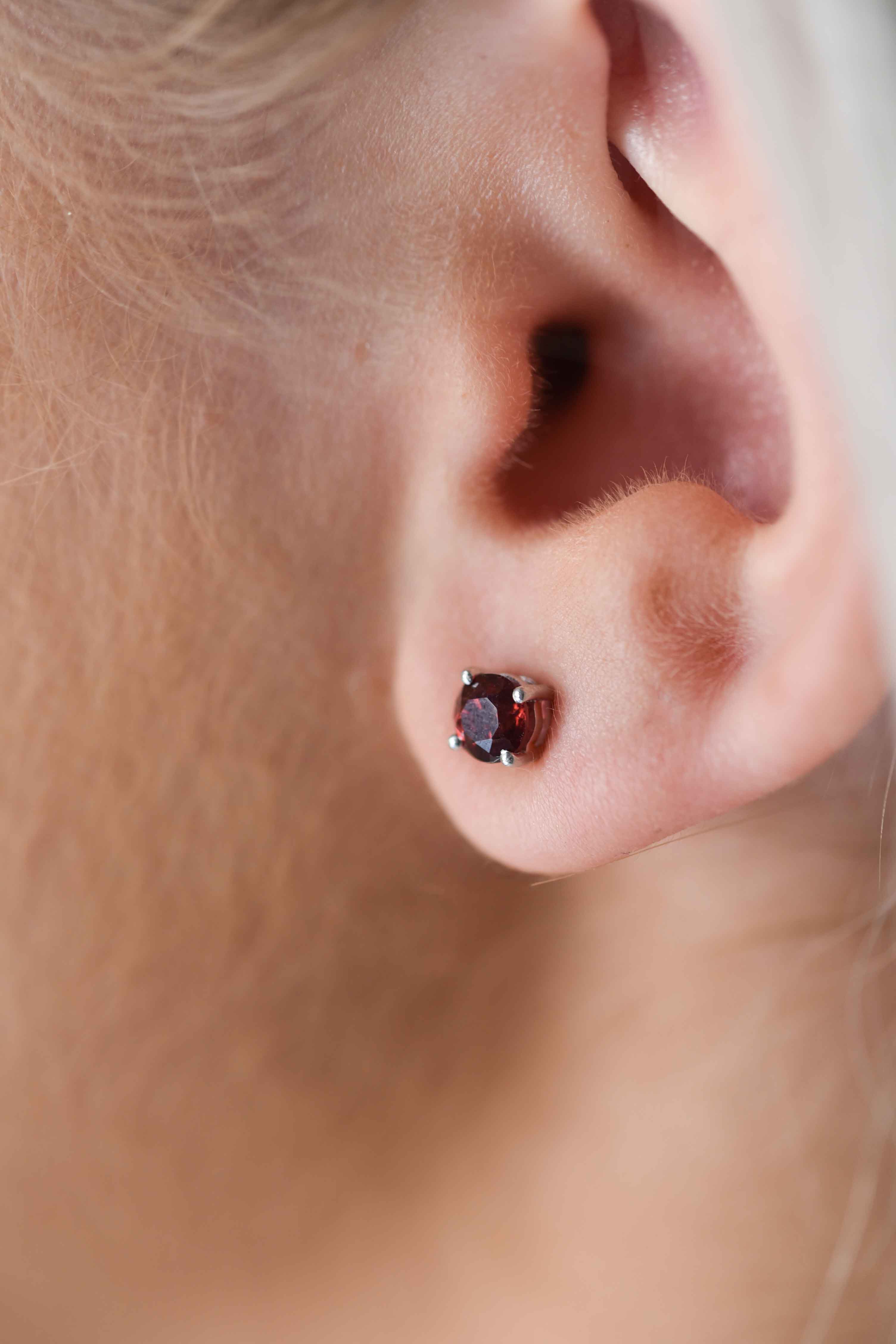 garnet studs earrings in sterling silver