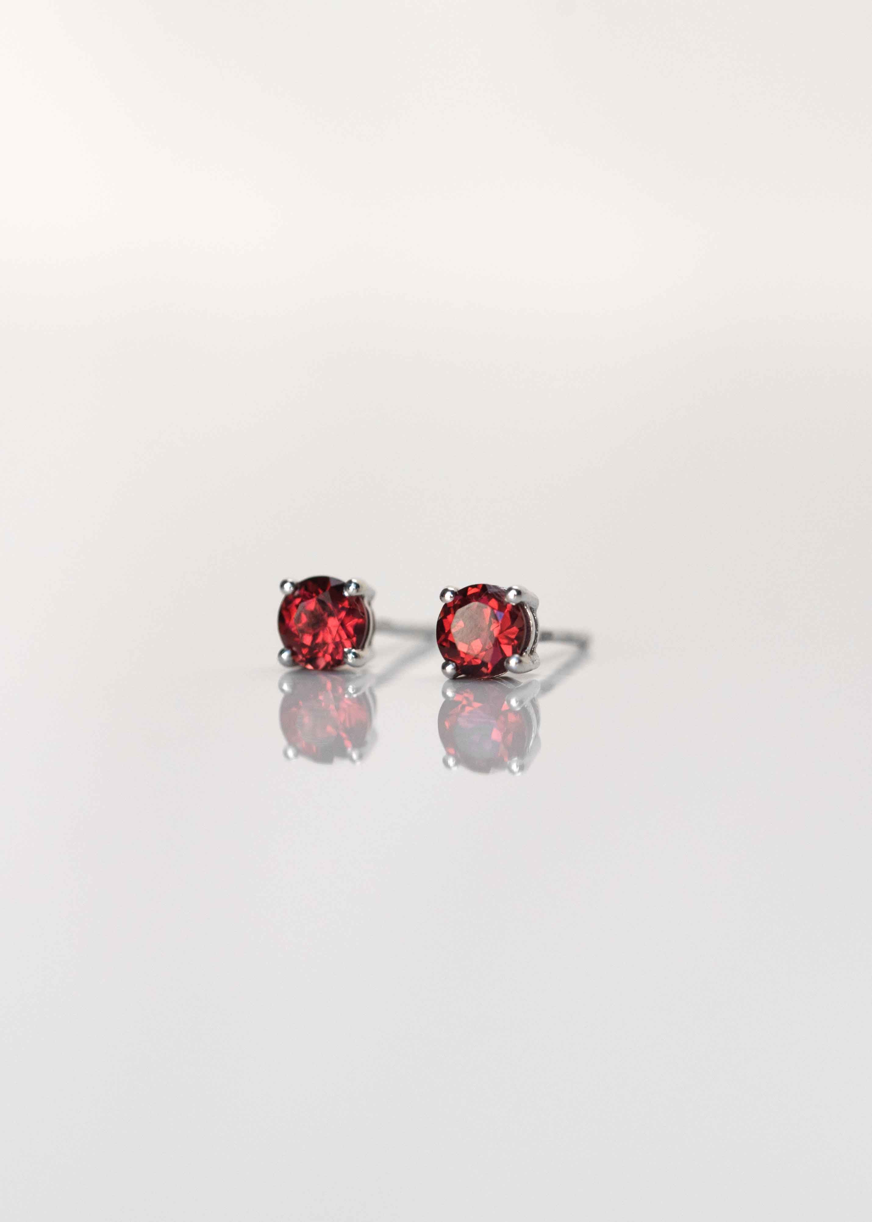 garnet studs earrings in sterling silver