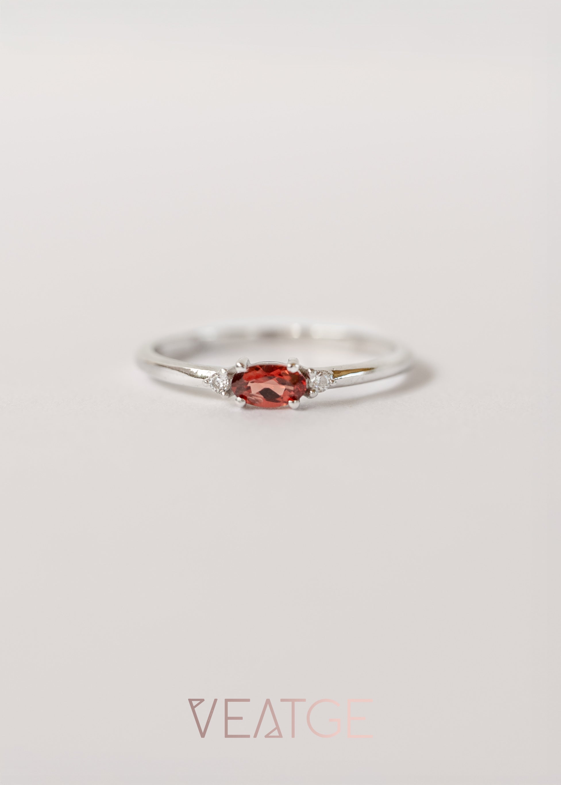 Silver birthstone stacking ring with a real garnet gemstone
