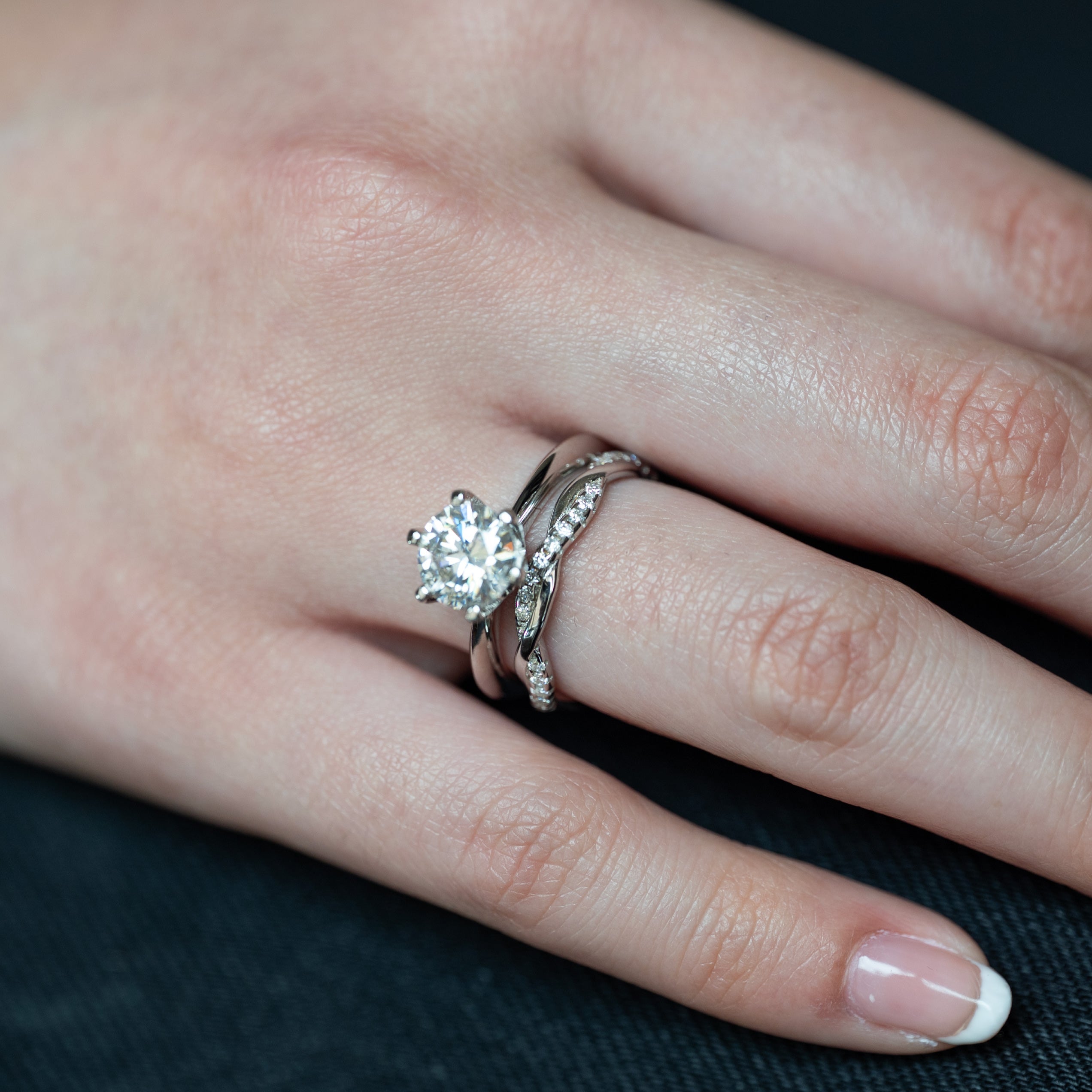 Moissanite Wedding Band Twist Design in sterling silver with diamonds
