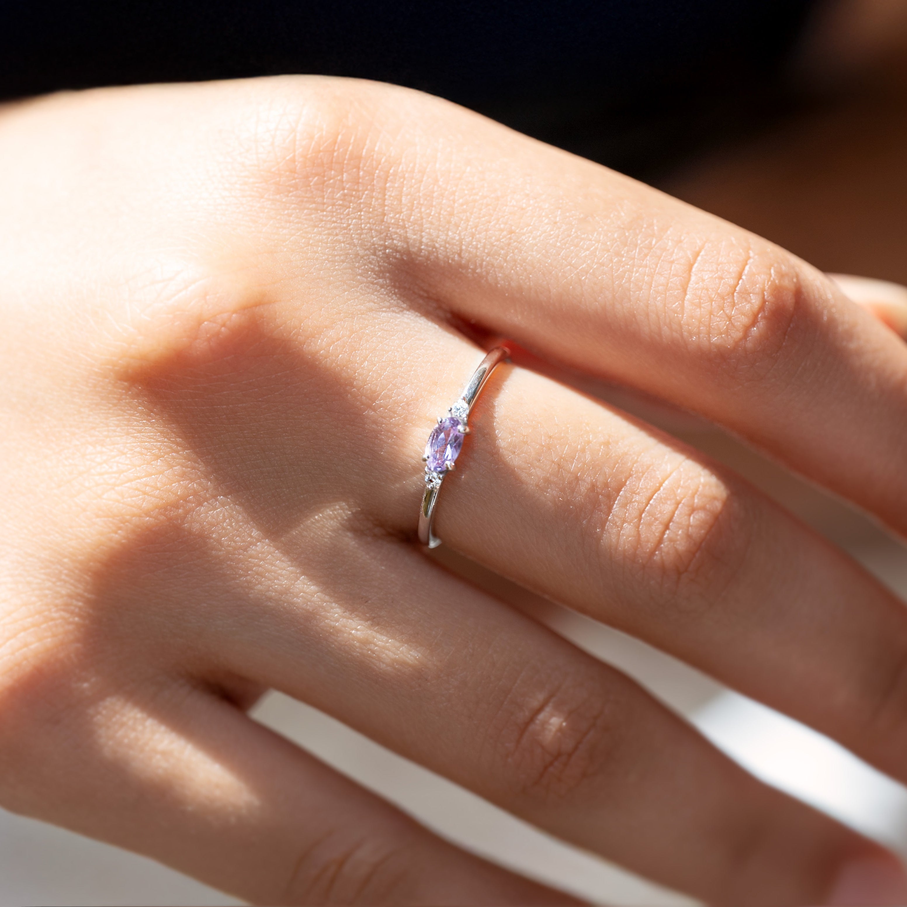 Silver dainty birthstone stacking ring with a real amethyst gemstone. 