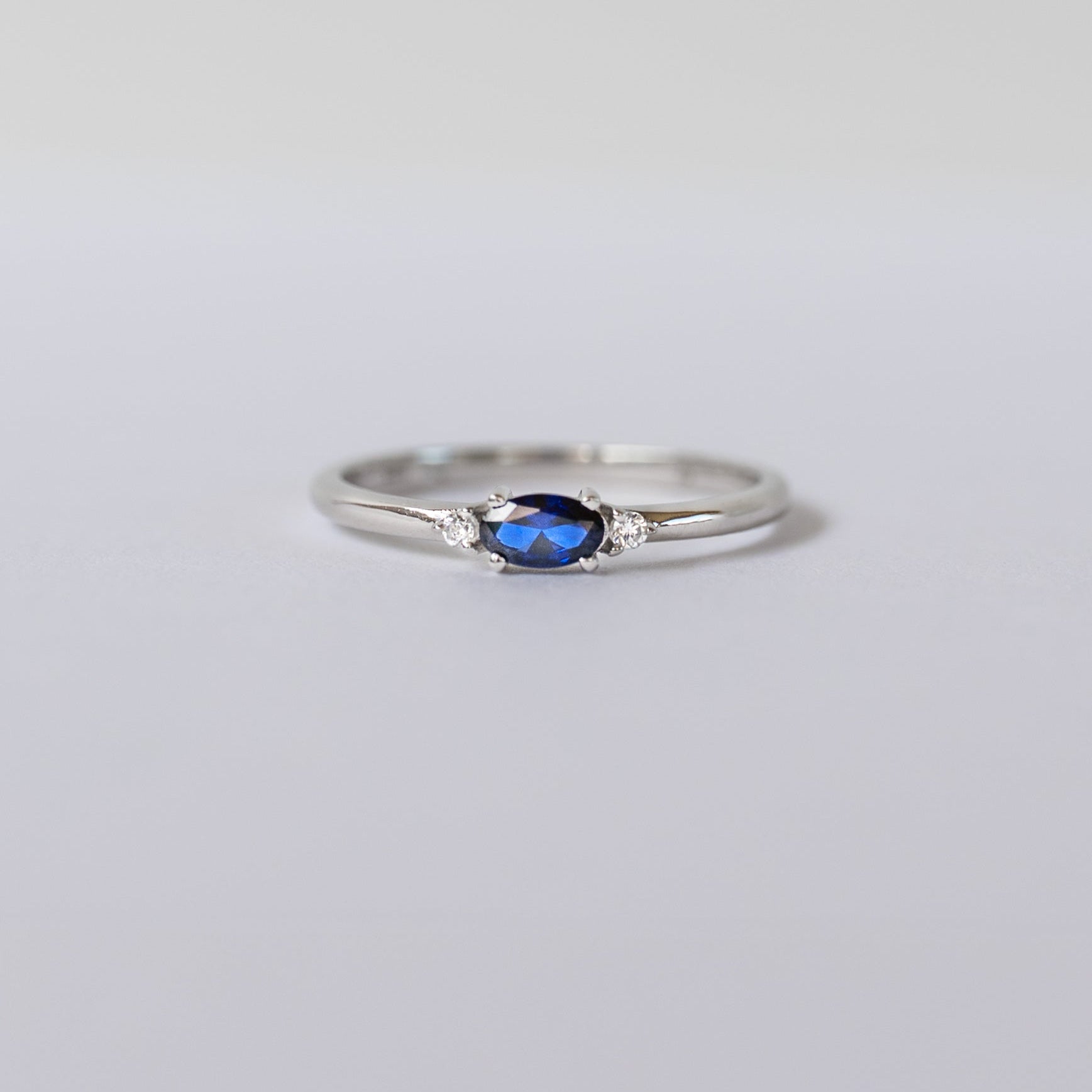 Silver dainty stacking ring with real sapphire.
