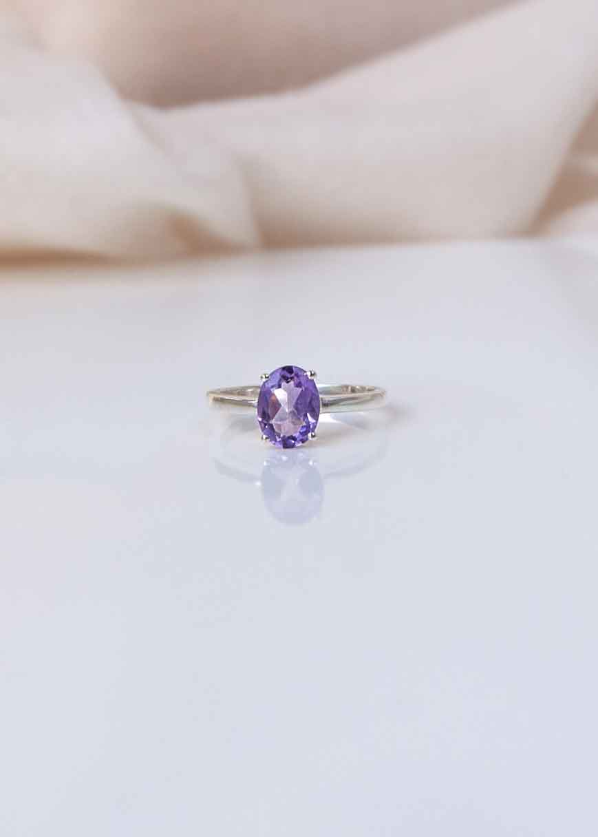 Sophisticated oval outlet amethyst sliver solitaire ring