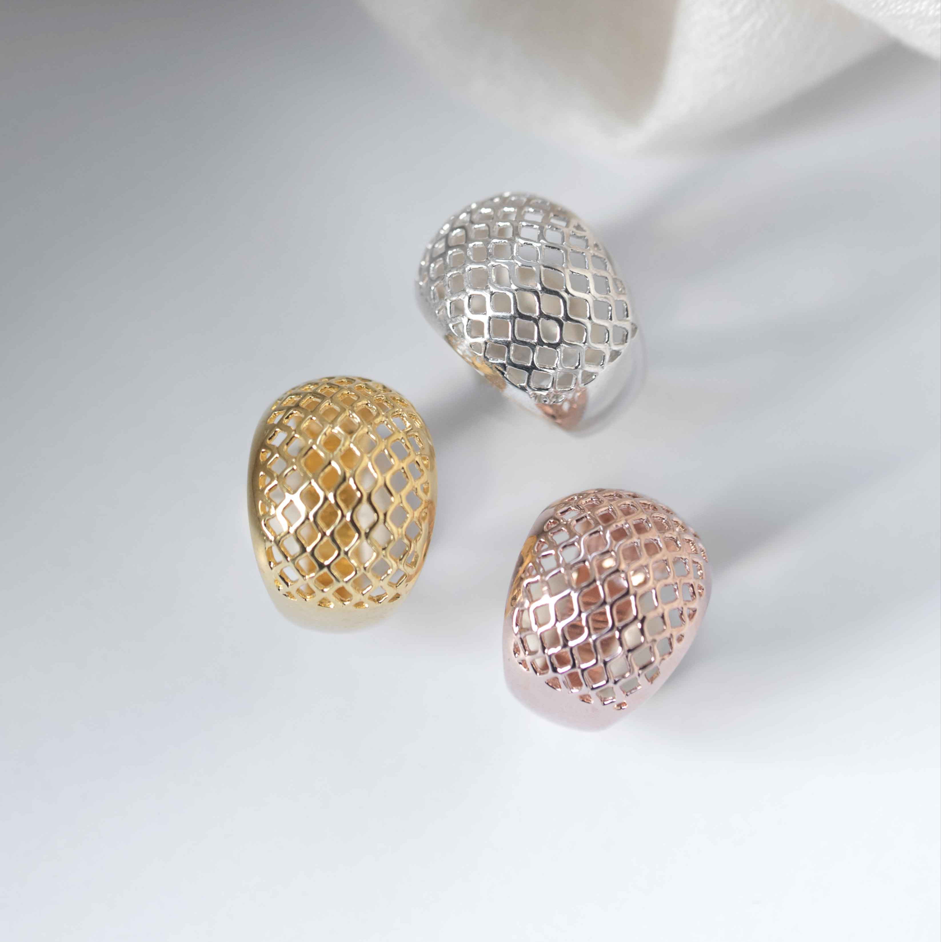 lattice dome ring in silver gold and rose gold